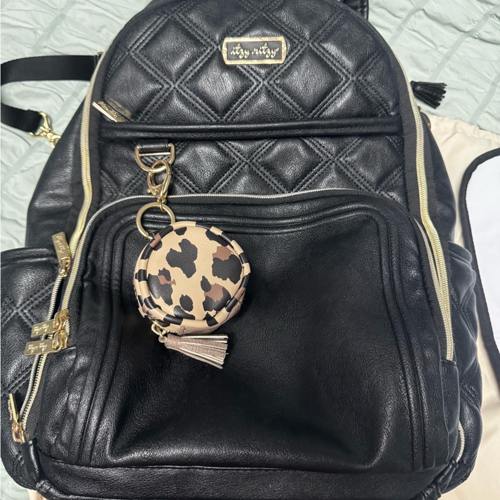 Itzy ritzy diaper backpack + dust bag + binky carrier keychain